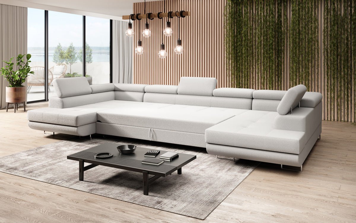 Projektowana sofa Taormina z funkcją spania i składania w bouclé