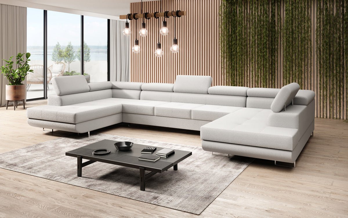Projektowana sofa Taormina z funkcją spania i składania w bouclé