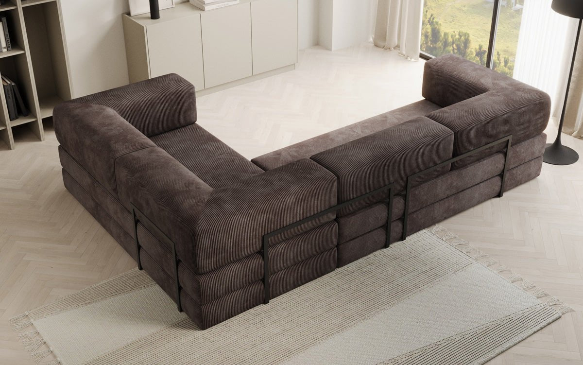 Sofa projektanta Lazy L obita materiałem Cord