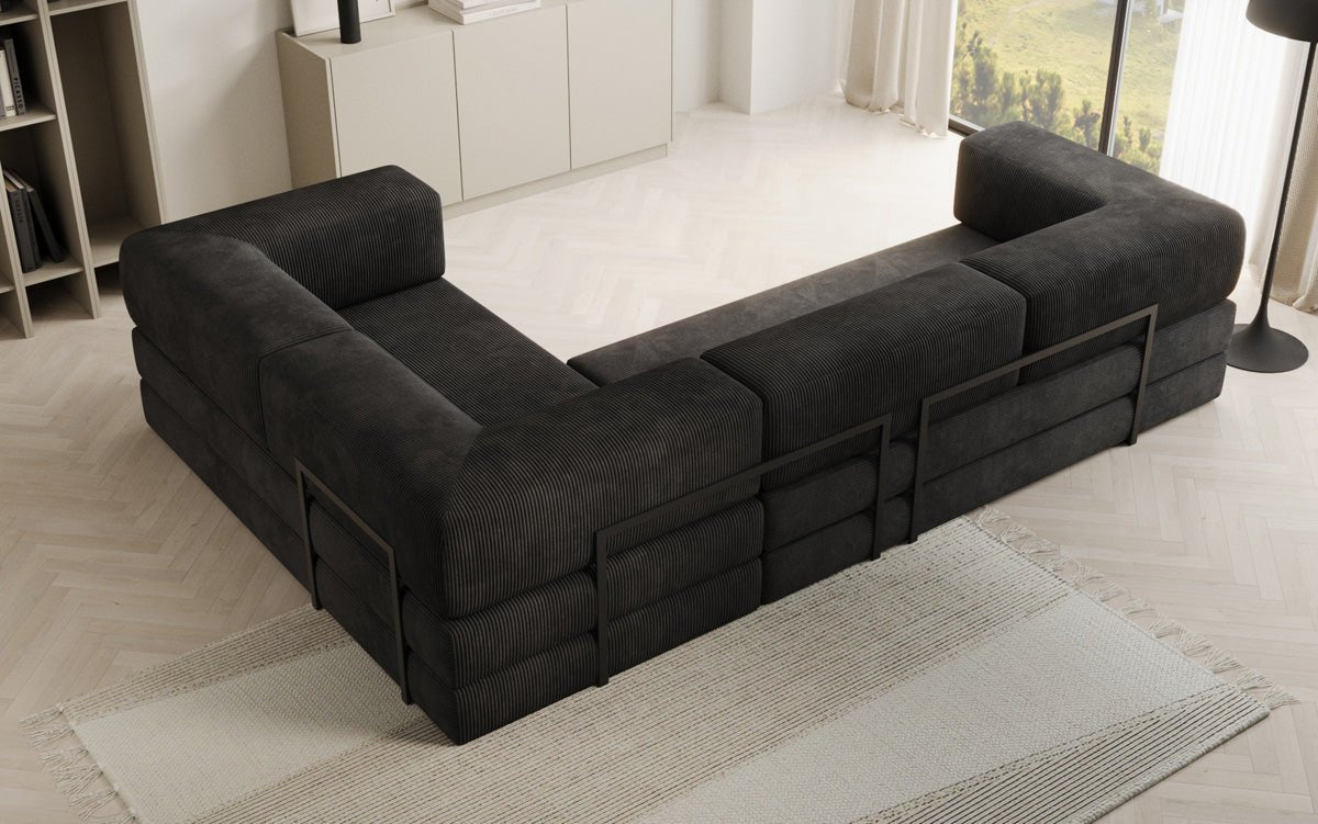 Sofa projektanta Lazy L obita materiałem Cord