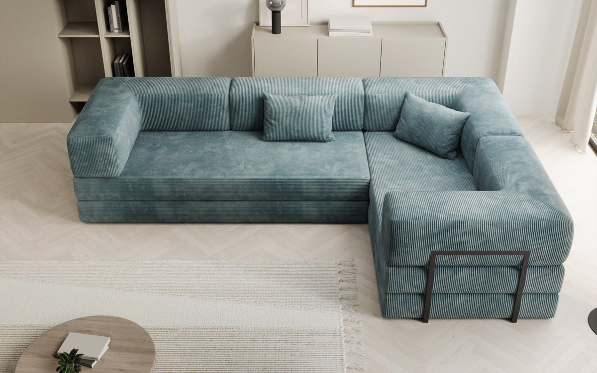 Sofa projektanta Lazy L obita materiałem Cord