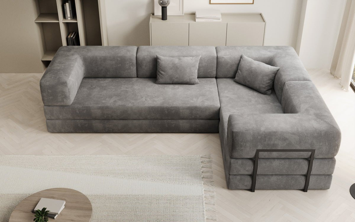 Sofa projektanta Lazy L obita materiałem Cord