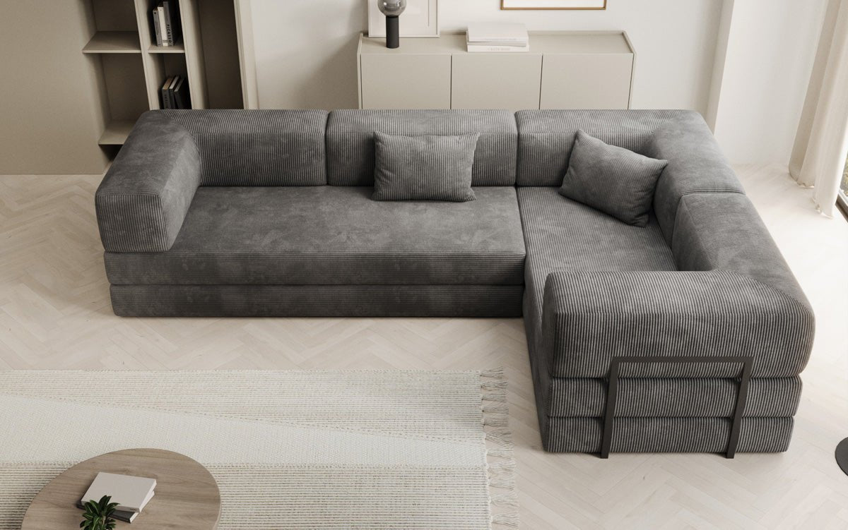 Sofa projektanta Lazy L obita materiałem Cord