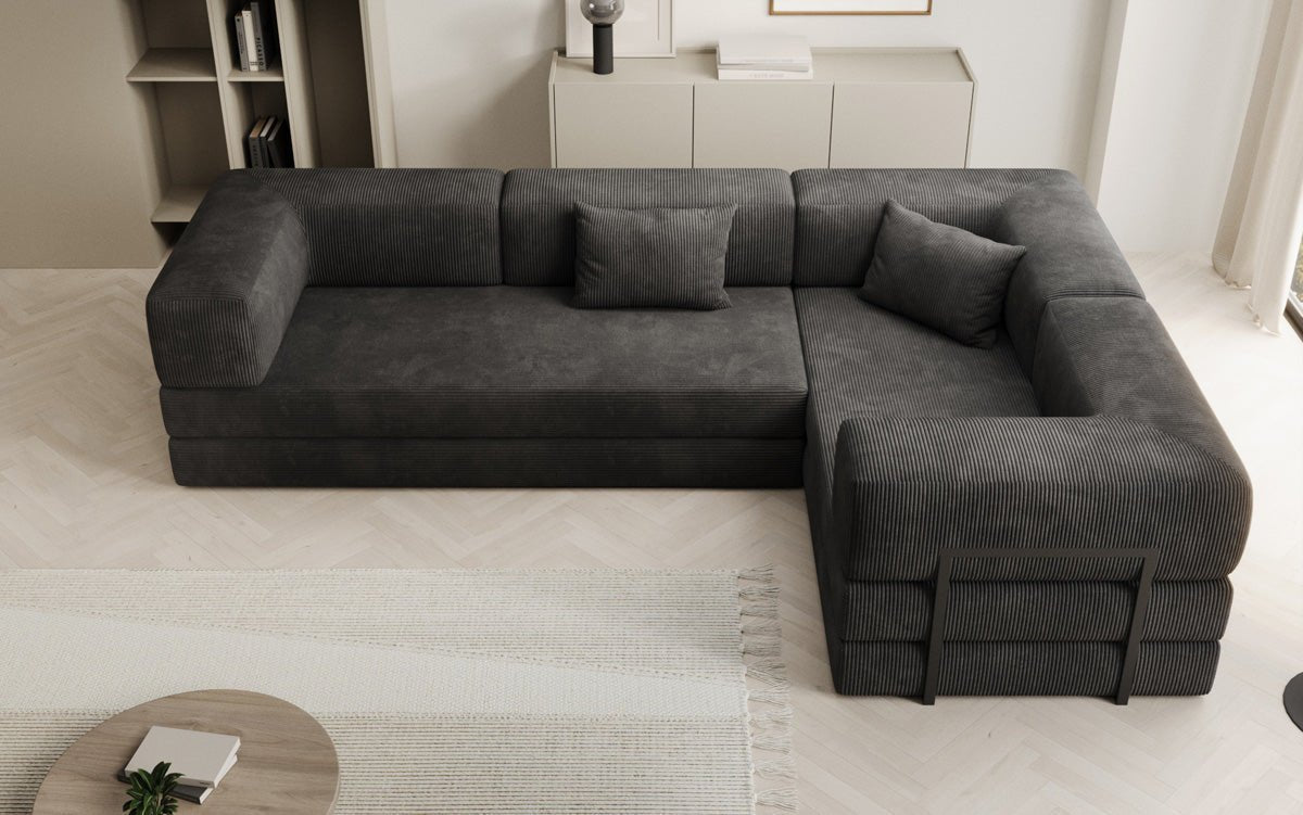 Sofa projektanta Lazy L obita materiałem Cord