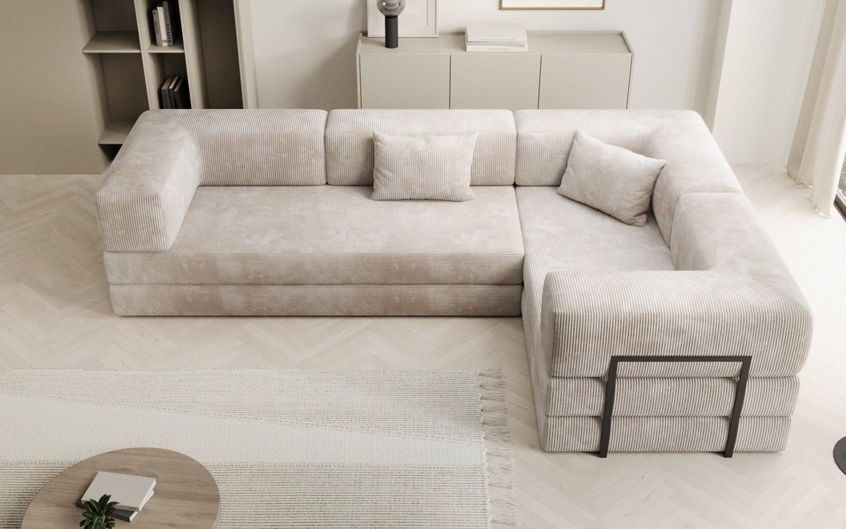 Sofa projektanta Lazy L obita materiałem Cord