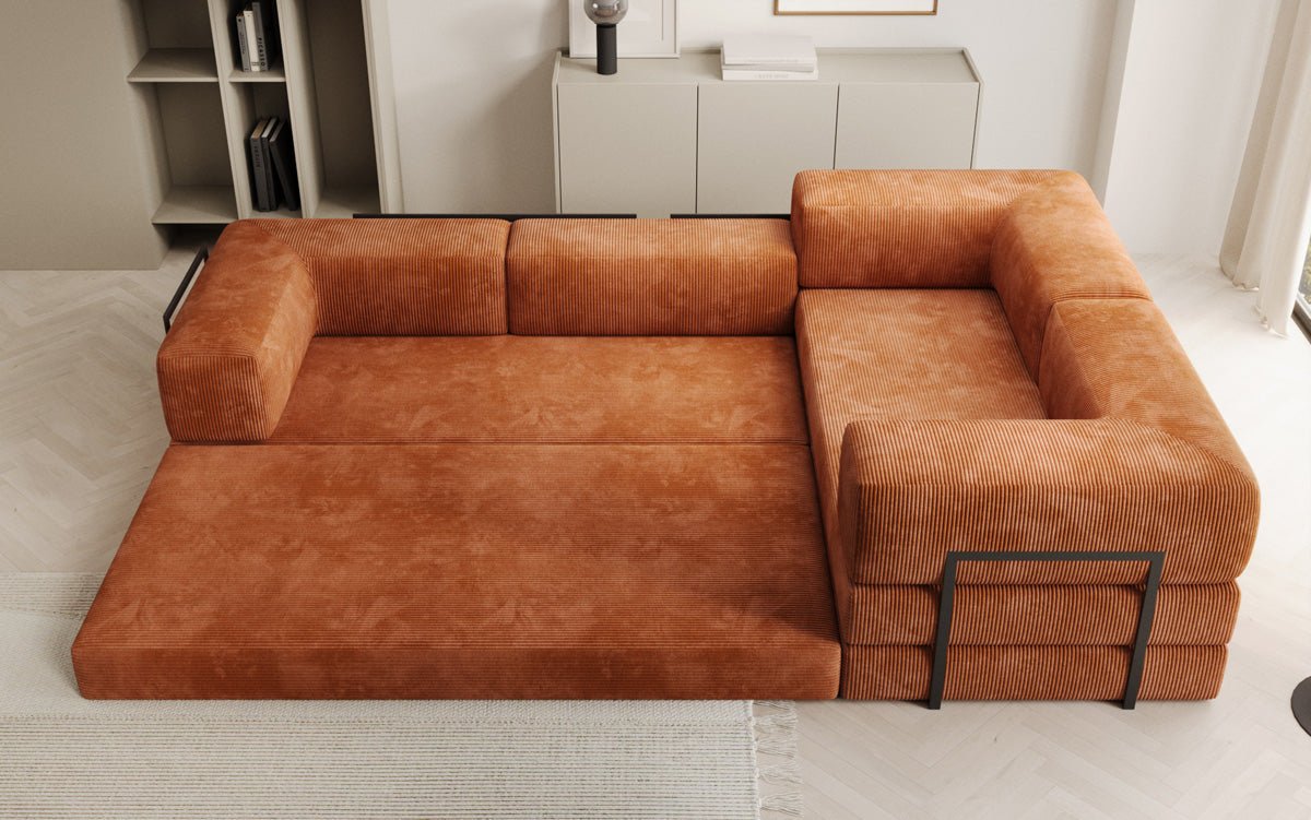Sofa projektanta Lazy L obita materiałem Cord