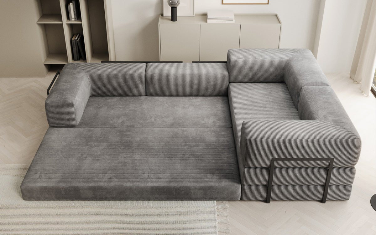 Sofa projektanta Lazy L obita materiałem Cord