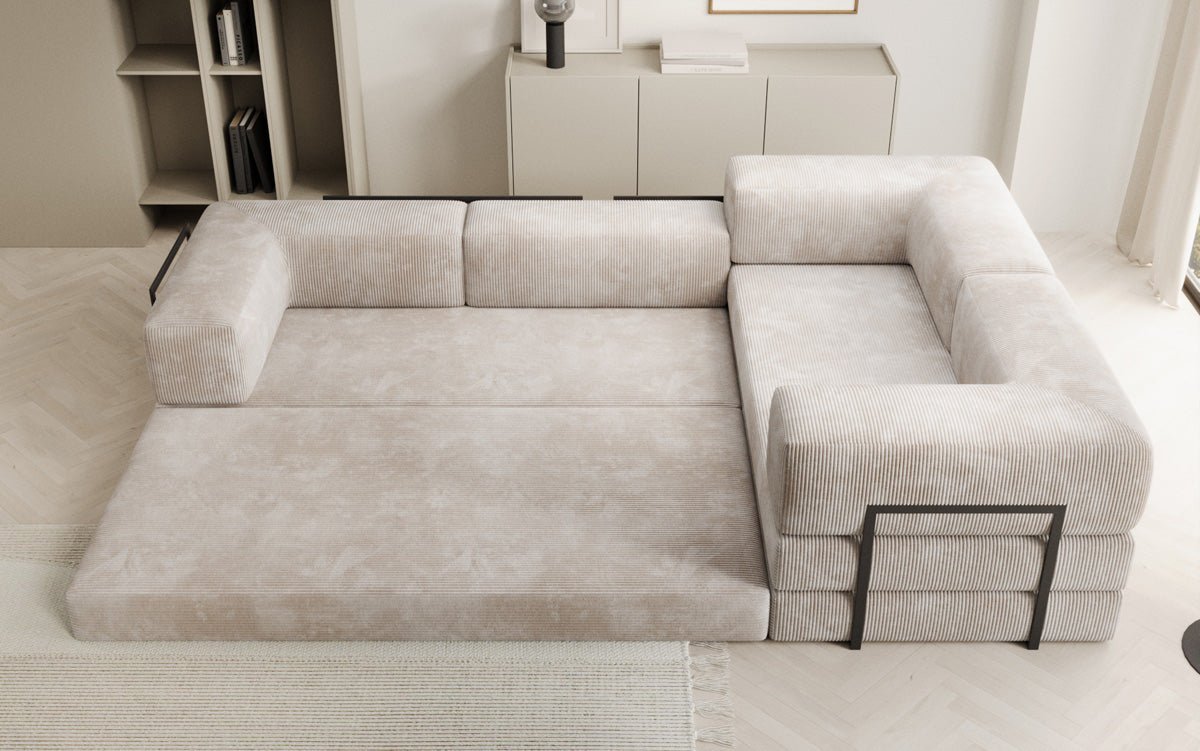 Sofa projektanta Lazy L obita materiałem Cord