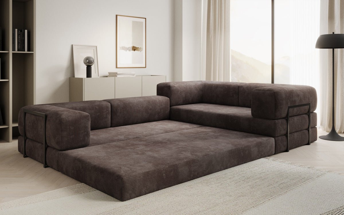 Sofa projektanta Lazy L obita materiałem Cord