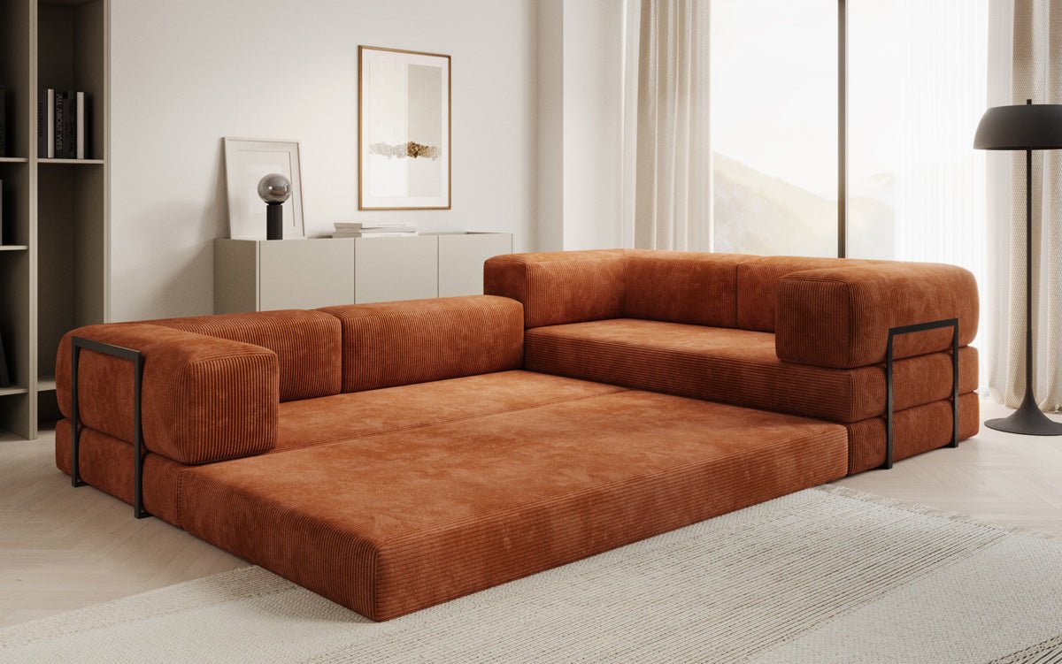 Sofa projektanta Lazy L obita materiałem Cord
