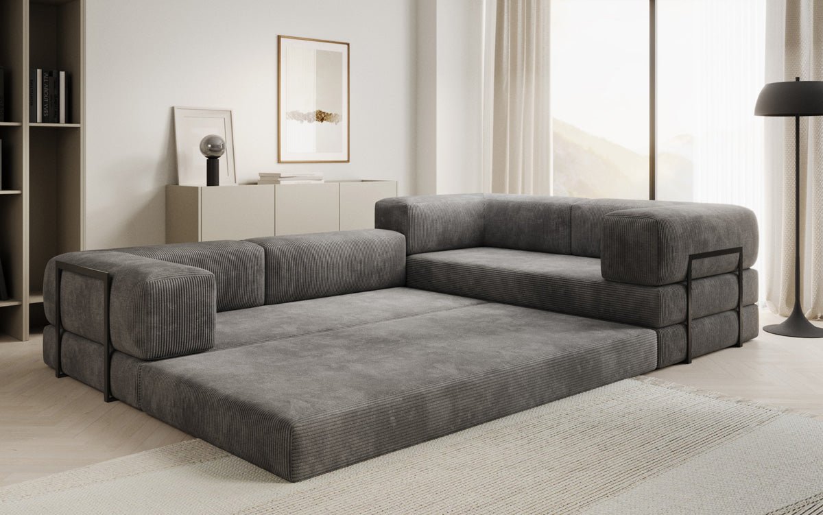 Sofa projektanta Lazy L obita materiałem Cord