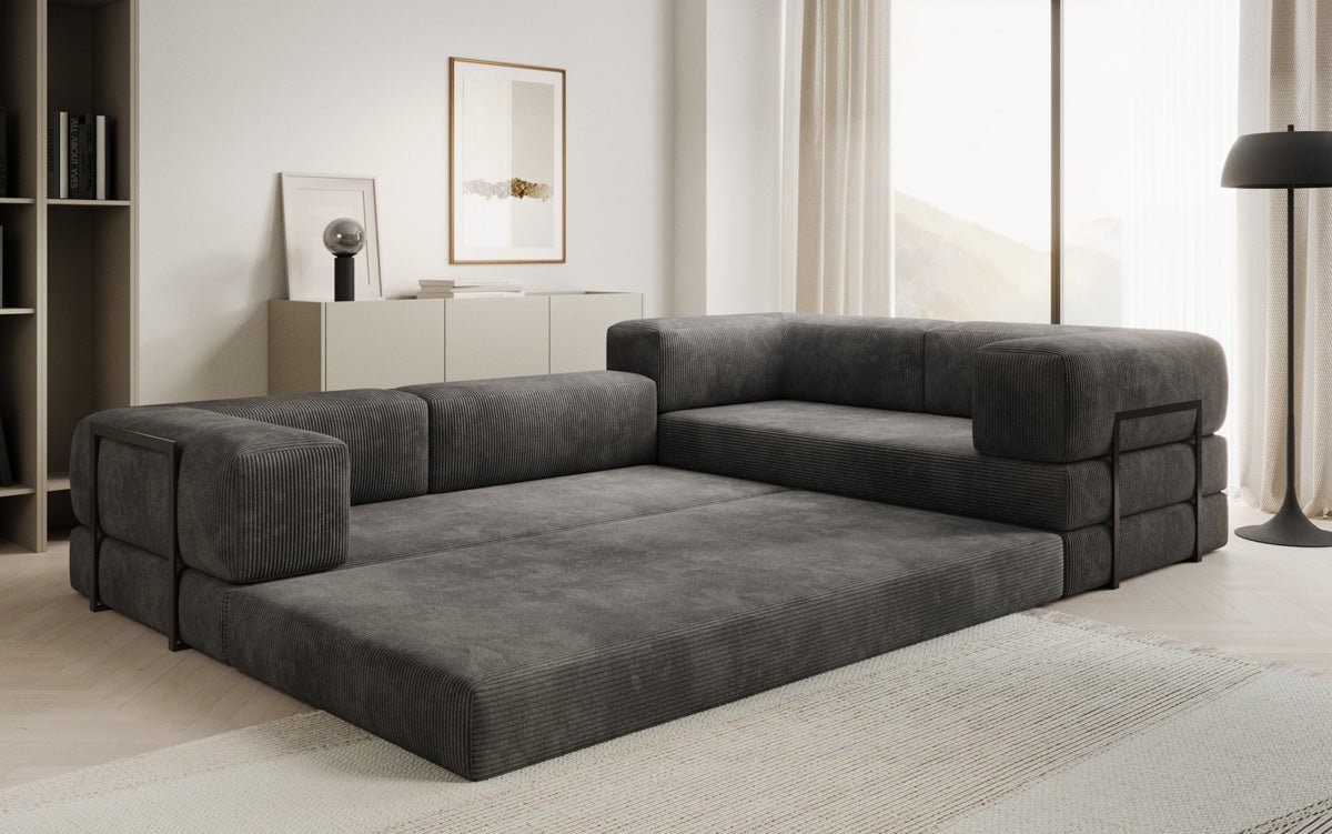 Sofa projektanta Lazy L obita materiałem Cord