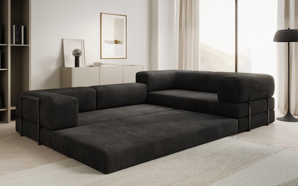 Sofa projektanta Lazy L obita materiałem Cord