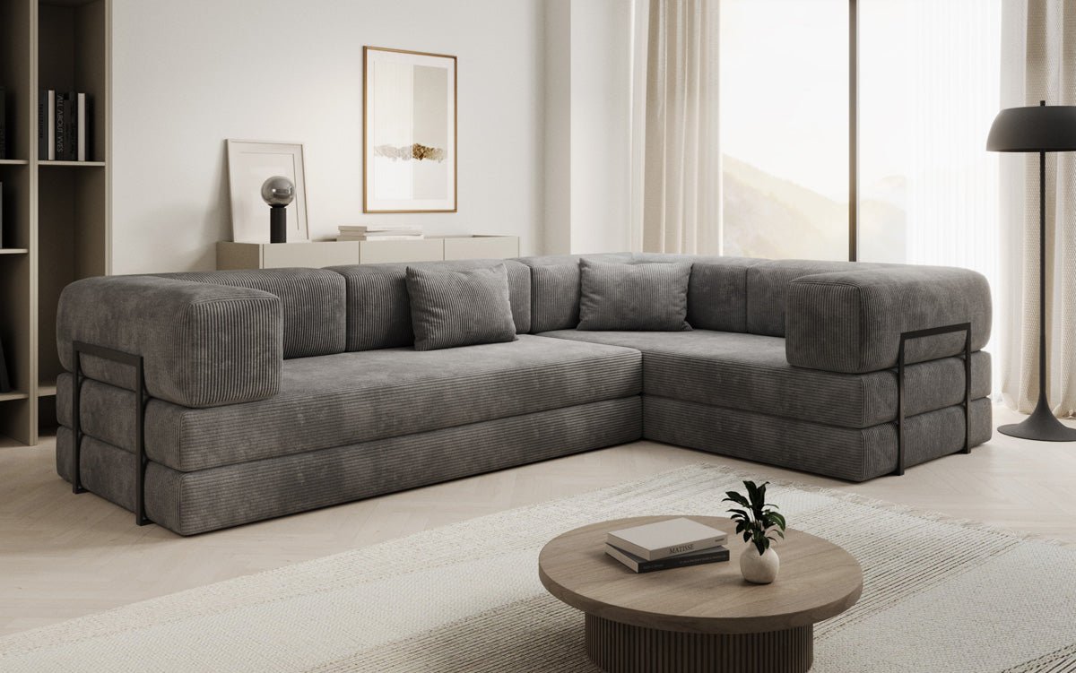 Sofa projektanta Lazy L obita materiałem Cord
