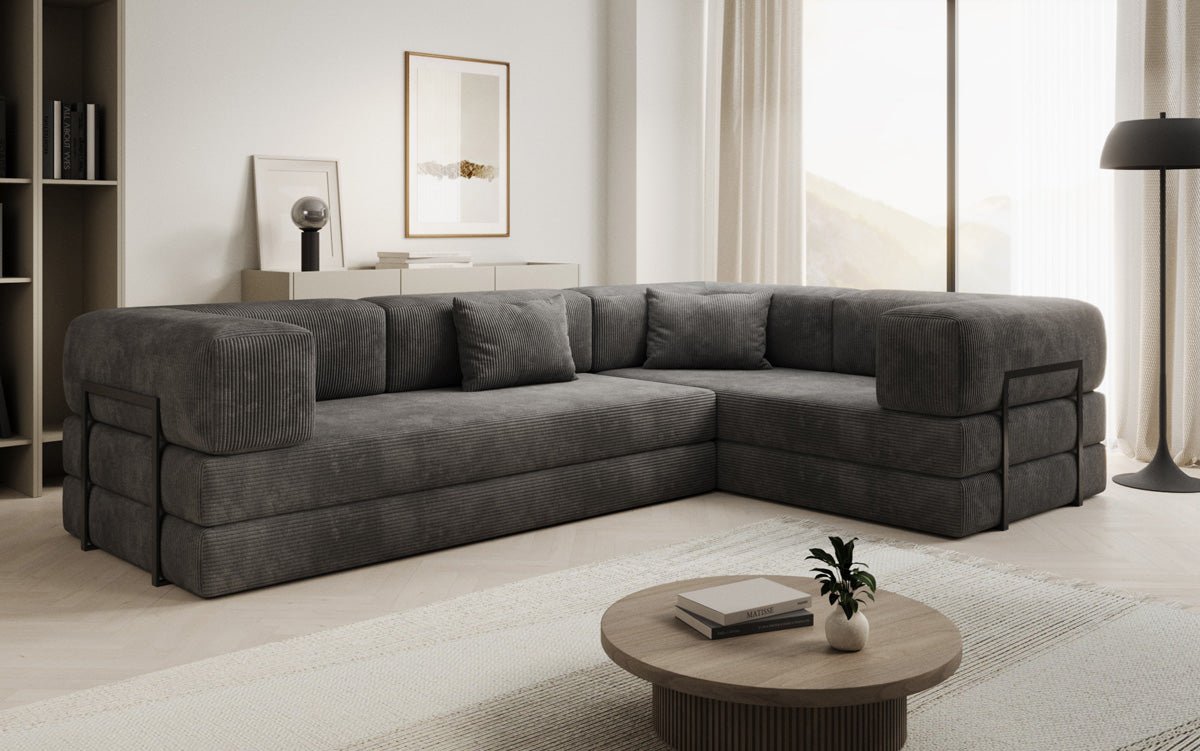 Sofa projektanta Lazy L obita materiałem Cord