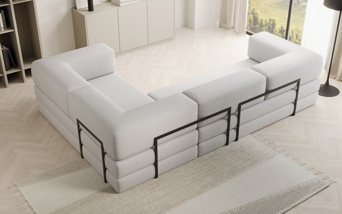 Sofa projektanta Lazy L obita tkaniną Bouclé