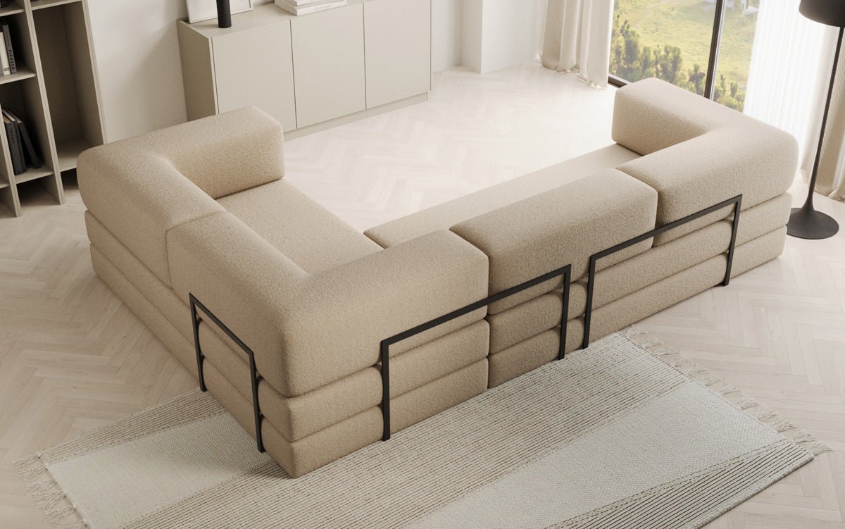 Sofa projektanta Lazy L obita tkaniną Bouclé