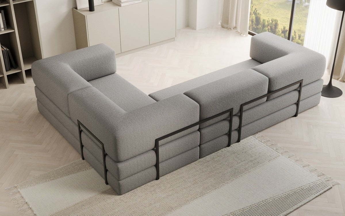 Sofa projektanta Lazy L obita tkaniną Bouclé