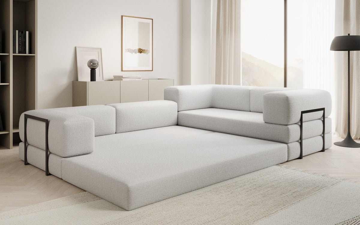 Sofa projektanta Lazy L obita tkaniną Bouclé