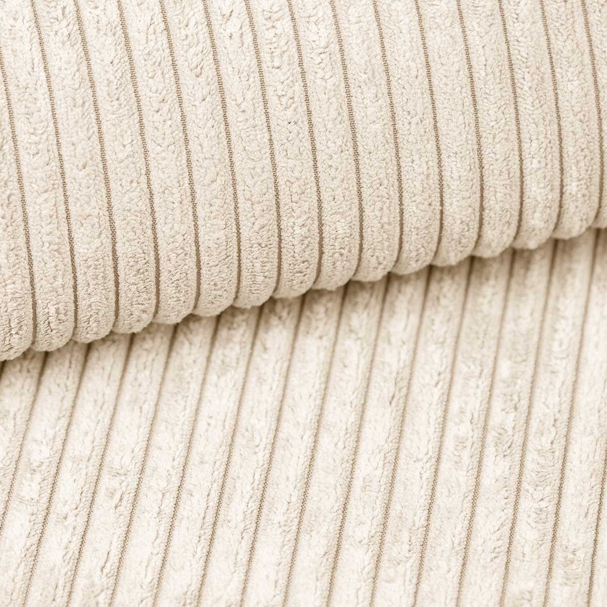 Sofa projektanta Lazy L obita materiałem Cord