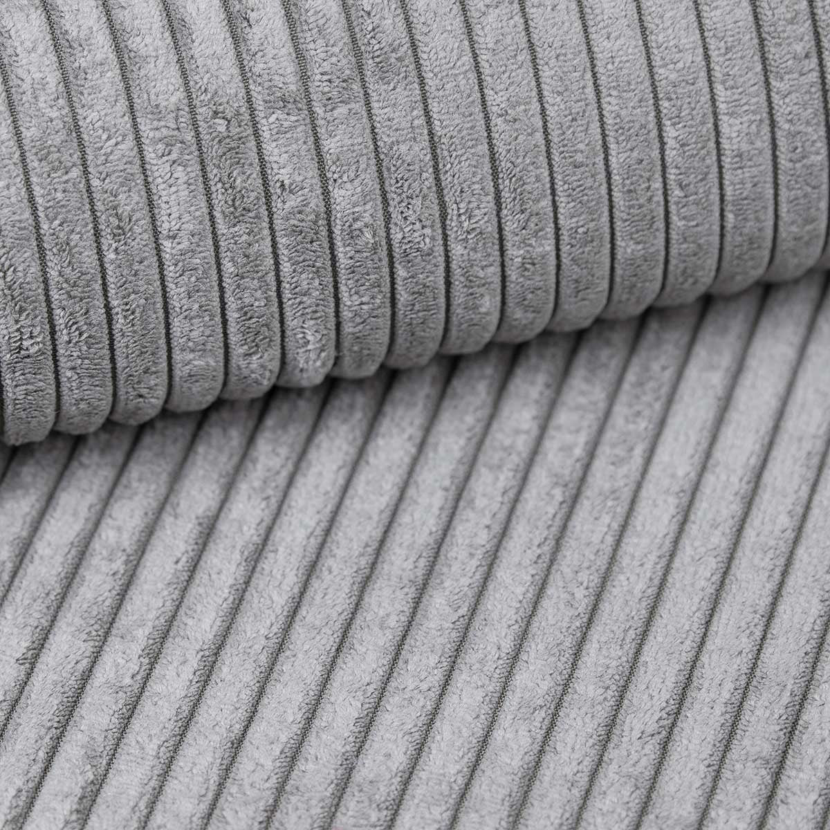 Sofa projektanta Lazy L obita materiałem Cord