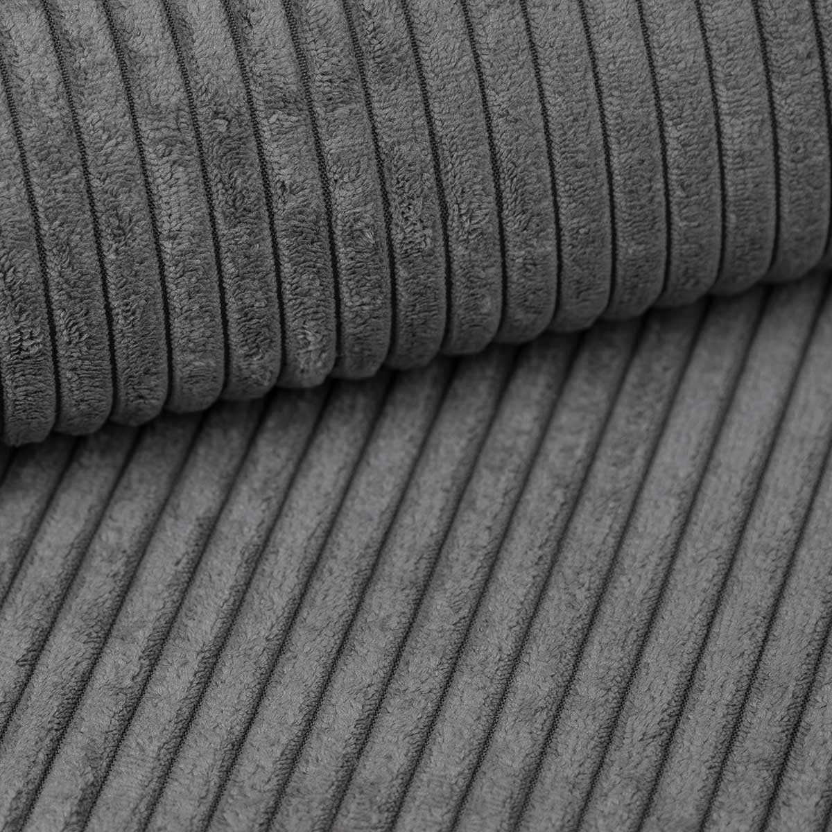 Sofa projektanta Lazy L obita materiałem Cord