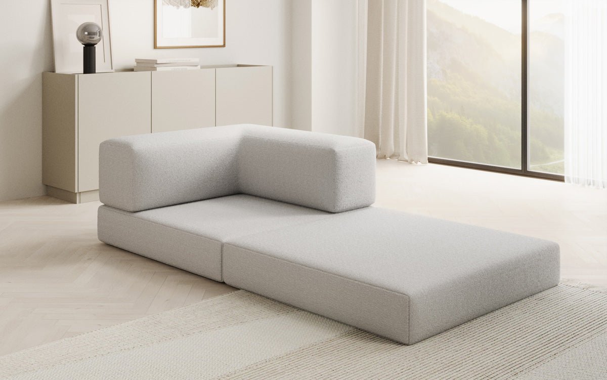 Projektowany fotel sofa Lazy w bouclé