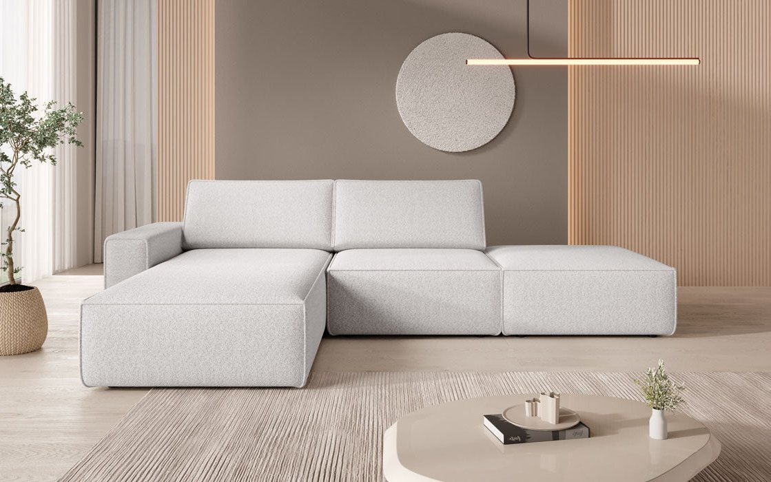 Modularna narożna sofa Yuma z pufem bocznym z bouclé